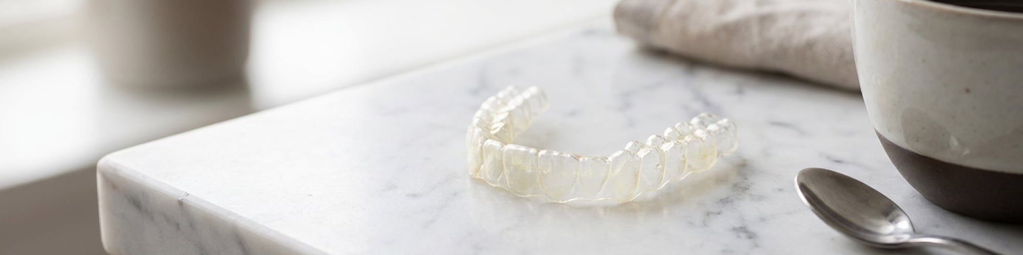 Why Your Invisalign Attachments Look Different After Six Weeks (And What That Tells You)